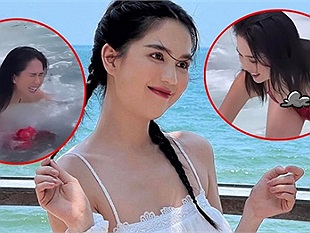 Ngọc Trinh bị sóng đánh sấp mặt khi đang mặc bikini siêu nhỏ, lộ rõ 3 vòng "hớ hênh"